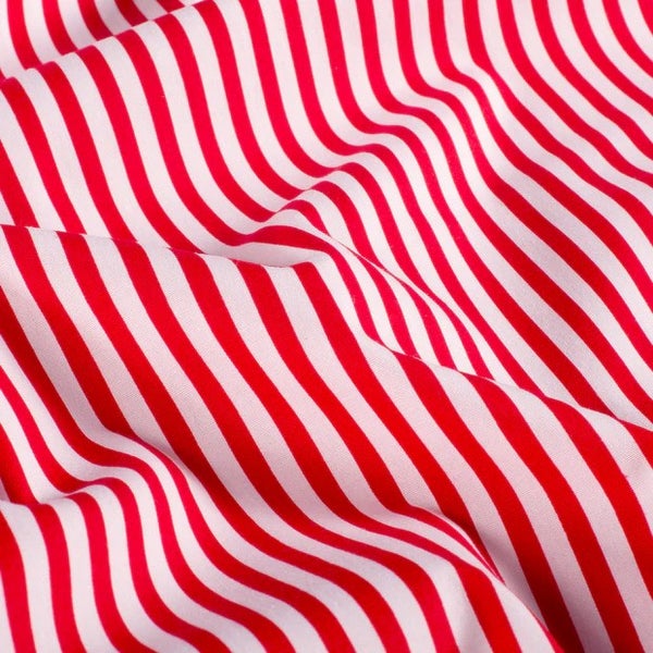 Candy stripe punavalkoraidallinen puuvillakangas