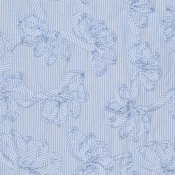 Kukkakirjottu sinivalkoraidallinen puuvillakangas