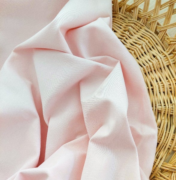 Vaaleanpunainen trikoo