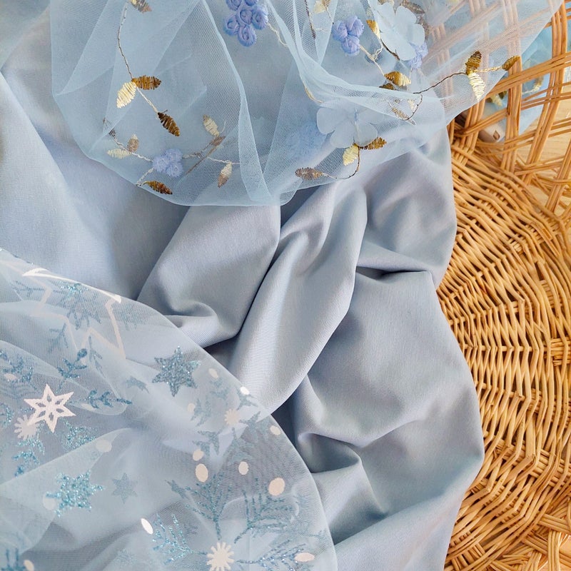 Vaaleansininen GOTS luomutrikoo